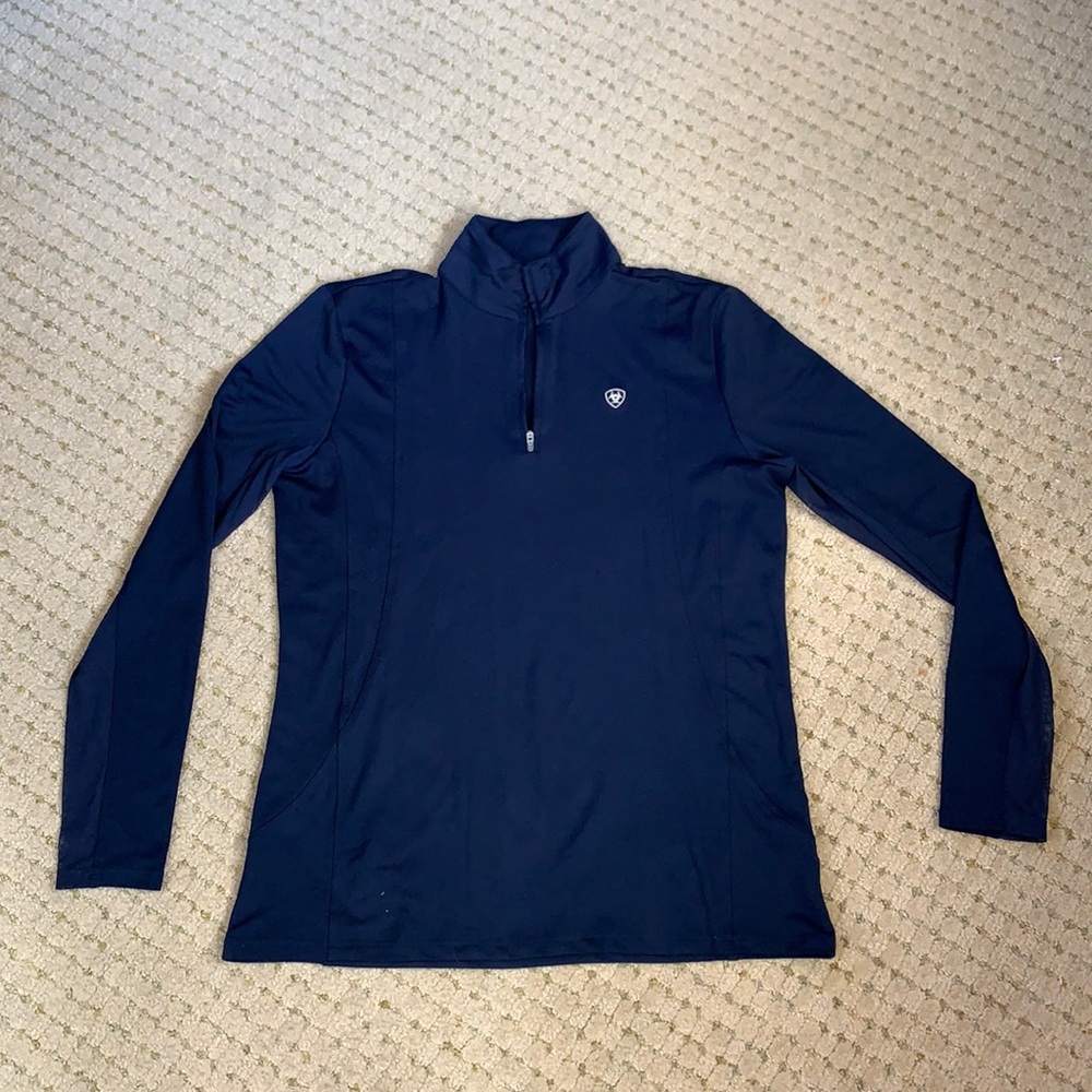 Ariat riding shirt. Super comfortable and light.